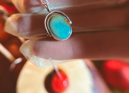 Turquoise spinner pendant